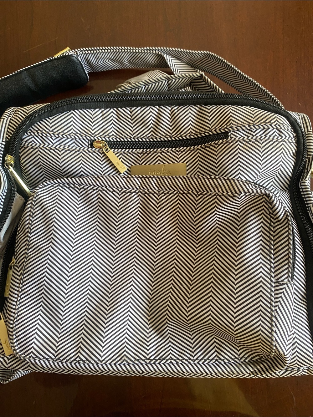 Black & White Herringbone diaper bag with changing mat.